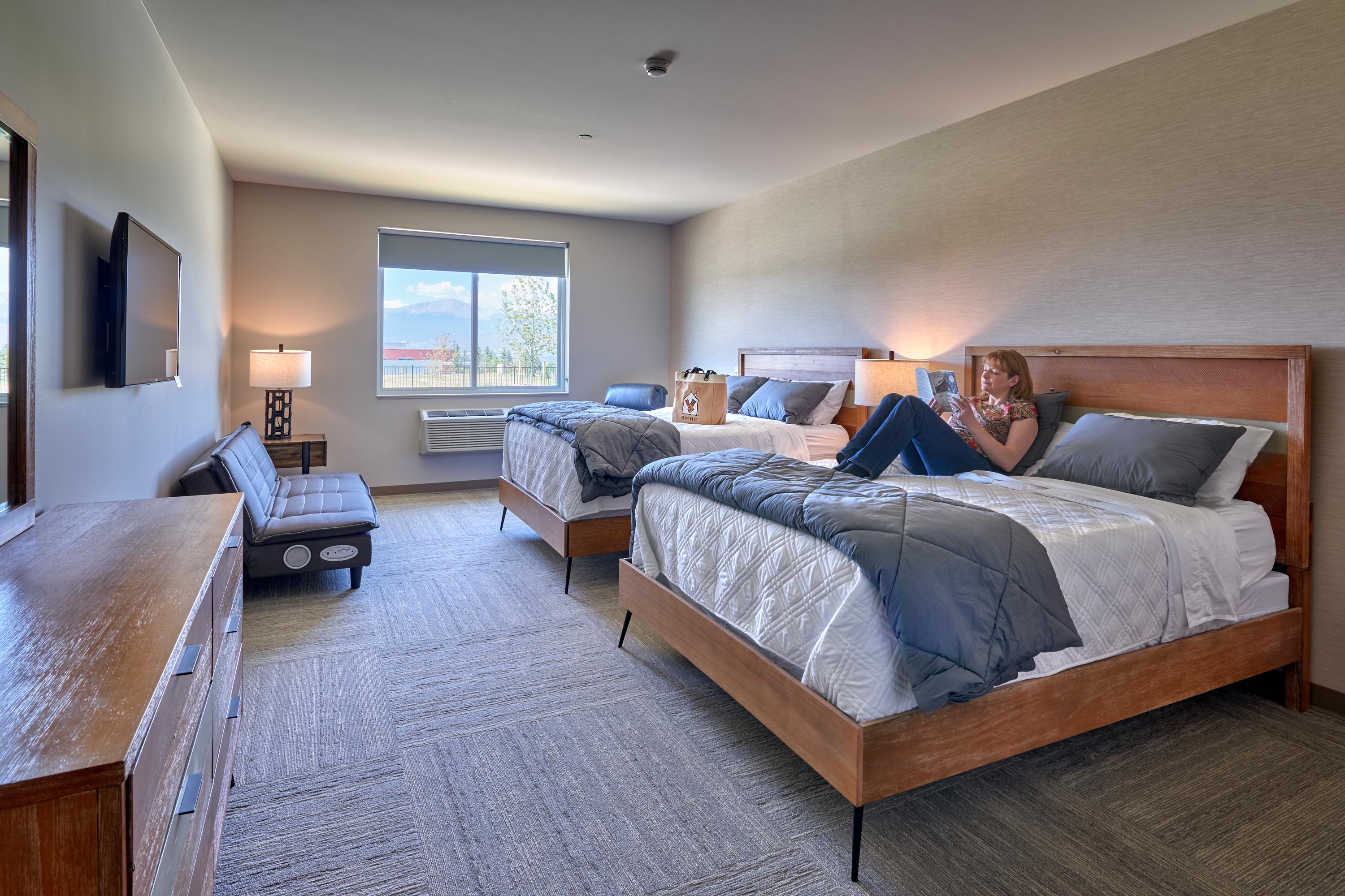 RMDH Interior Photo Bedroom 2 With People 3Kx2K